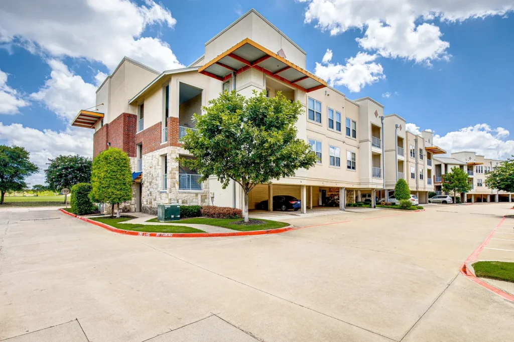Building exterior with private garages and covered parking