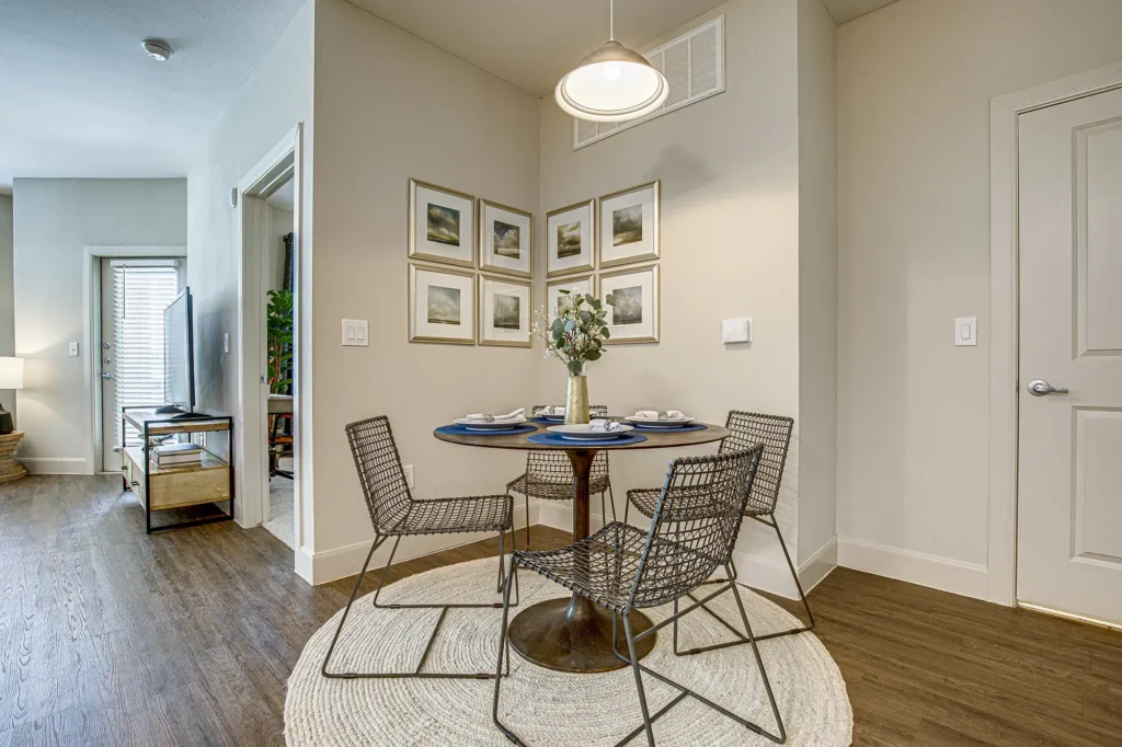 Dining area next to the living room and kitchen