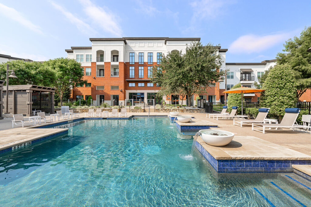 Sparkling pool with lounge chairs